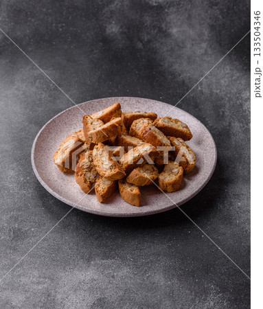 Italian cantuccini cookies with almonds, a sweet biscuit dessert. Cantuccini cookies Italian cantuccini cookies with almonds, a sweet biscuit dessert. Cantuccini cookies 133504346
