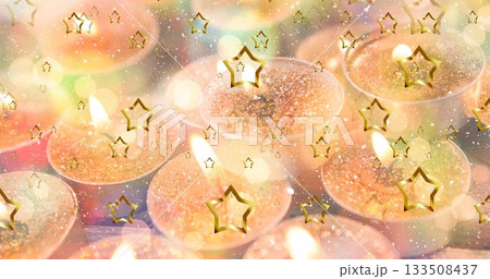 Sparkling metal tea light candles casting glow on tabletop, with glitter wax and star confetti Sparkling metal tea light candles casting glow on tabletop, with glitter wax and star confetti 133508437