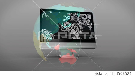 Floating widescreen monitor and globe with grid rotating in virtual studio, with gear icon overlay 133508524