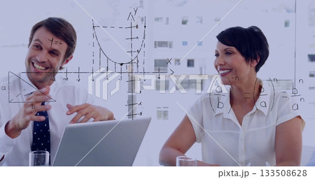 Tie-clad man and blouse-clad woman analyzing data in office, with silver laptop and math overlay Tie-clad man and blouse-clad woman analyzing data in office, with silver laptop and math overlay 133508628