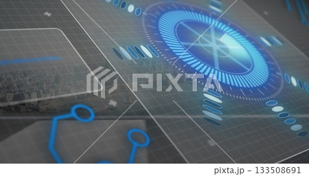 Displaying circular holographic radar over grid on dashboard, with city skyline and segmented rings 133508691