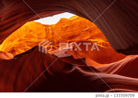 Interior Slot Canyon View with Sculpted Red and Orange Walls 133509709