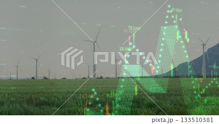 Central wind turbine standing in grassy field, with floating data overlay showing numeric charts Central wind turbine standing in grassy field, with floating data overlay showing numeric charts 133510381