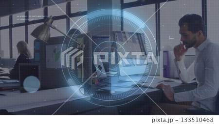Thinking man reviewing screen at right desk in open plan office, with file folders, copy space Thinking man reviewing screen at right desk in open plan office, with file folders, copy space 133510468
