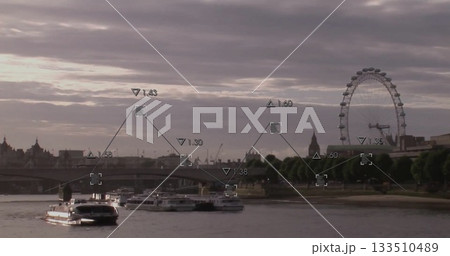 Gliding white-and-black passenger riverboat under stone bridge at dusk, with Ferris wheel Gliding white-and-black passenger riverboat under stone bridge at dusk, with Ferris wheel 133510489