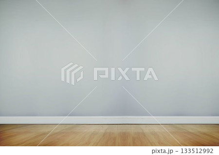 minimal empty room is being shown in flat design featuring light gray walls and hardwood floor 133512992