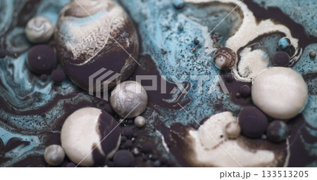 Ink bubble particles. Paint water. Defocused blue white purple color glitter oil round liquid floating on abstract bokeh background. Ink bubble particles. Paint water. Defocused blue white purple color glitter oil round liquid floating on abstract bokeh background. 133513205