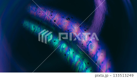 Blur psychedelic texture. Circling fluid. Green purple neon color paint rainbow bubble dark black flow on abstract light background. Blur psychedelic texture. Circling fluid. Green purple neon color paint rainbow bubble dark black flow on abstract light background. 133513249