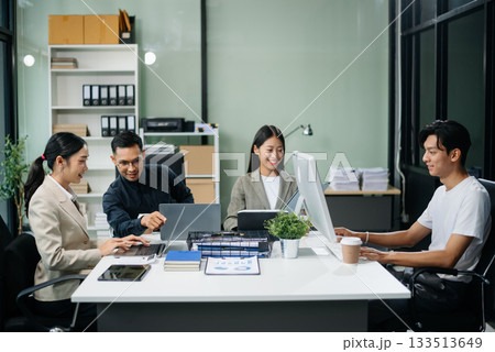 Group of Asian business meeting in planning design in creative business discussing work Group of Asian business meeting in planning design in creative business discussing work 133513649