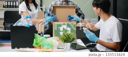 Eco-friendly teamwork with this office recycling scene. Perfect for showcasing sustainability, collaboration, 133513829