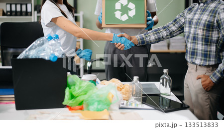 Eco-friendly teamwork with this office recycling scene. Perfect for showcasing sustainability, collaboration, Eco-friendly teamwork with this office recycling scene. Perfect for showcasing sustainability, collaboration, 133513833