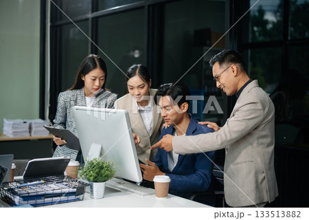 Group of Asian business meeting in planning design in creative business discussing work 133513882