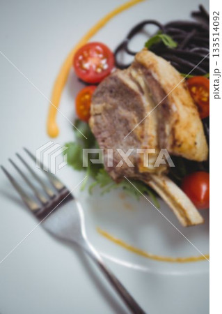 High angle view of lamb chop in plate High angle view of lamb chop in plate 133514092