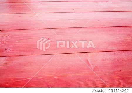Flat design showing red painted wooden planks covering width, highlighting grain textures and seams Flat design showing red painted wooden planks covering width, highlighting grain textures and seams 133514260