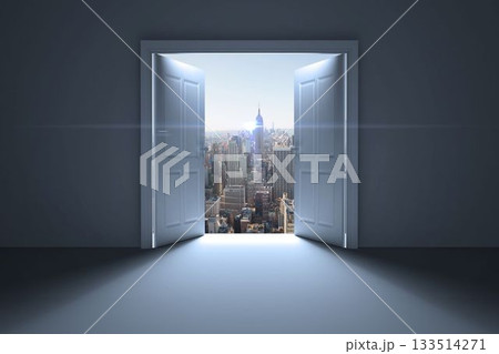 City seen from open door with lens flare against sky 133514271