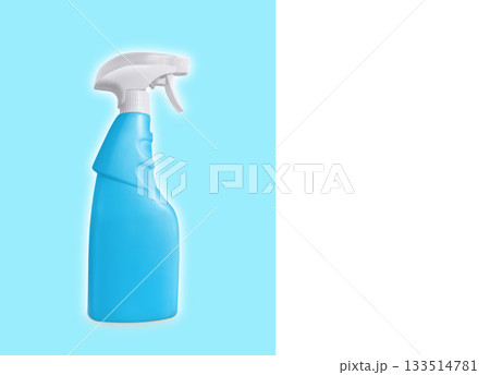 Isolated blue spray bottle on white and blue background. There is space for text. Isolated blue spray bottle on white and blue background. There is space for text. 133514781