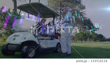 Couple wearing polo shirts and holding club in golf cart on fairway, with digital stock chart Couple wearing polo shirts and holding club in golf cart on fairway, with digital stock chart 133518118