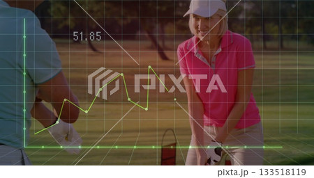 Standing golfers in pink polo and blue polo on fairway holding clubs, grid, graph showing 51 Standing golfers in pink polo and blue polo on fairway holding clubs, grid, graph showing 51 133518119