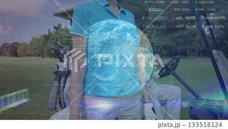 Standing woman wearing blue polo beige pants on golf fairway, with cart, clubs and digital overlays 133518124