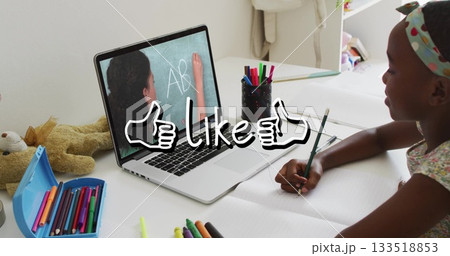 Watching girl wearing patterned shirt following tutor writing AB on laptop at home desk, copy space Watching girl wearing patterned shirt following tutor writing AB on laptop at home desk, copy space 133518853