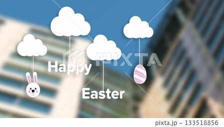 Showing white Easter clouds hanging over cityscape with Happy Easter text, bunny face, egg 133518856