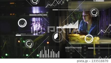 IT technician scanning fiber optic cables using tablet in server room, with LEDs, copy space 133518870