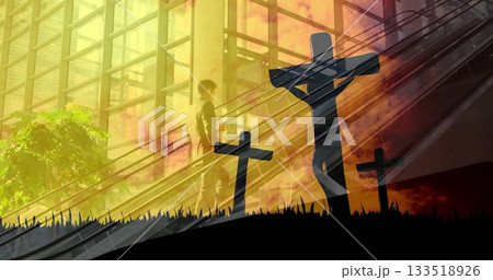 Standing adult man riding escalator in modern atrium, with sunlight beams and crosses, copy space Standing adult man riding escalator in modern atrium, with sunlight beams and crosses, copy space 133518926