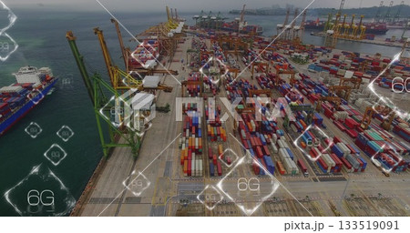 Showing aerial port quay with containers, gantry cranes and container ships under digital 6G icons 133519091