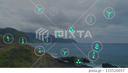 Displaying grassy hillside path running along coastal bluff, with floating digital icons Displaying grassy hillside path running along coastal bluff, with floating digital icons 133520057