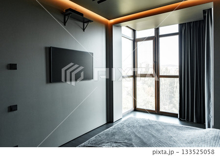 Modern bedroom design with large windows and minimalistic decor in apartment Modern bedroom design with large windows and minimalistic decor in apartment 133525058