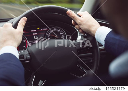 Close-up of steering wheel 133525379