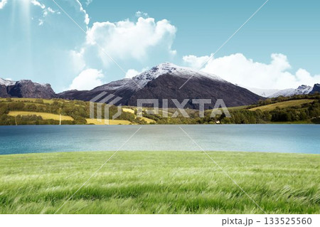 Flat design is showing green meadow flowing into blue lake with snow-capped mountain and clouds 133525560