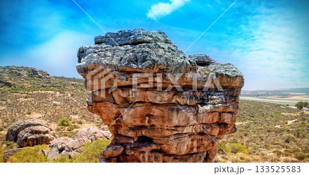 Big rock with landscape behind Big rock with landscape behind 133525583