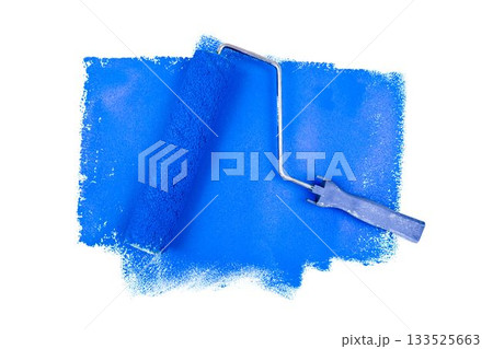 Blue paint roller over white background 133525663