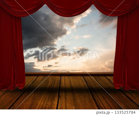 flat design illustration is showing red velvet curtains framing wooden stage floor and cloudy sky flat design illustration is showing red velvet curtains framing wooden stage floor and cloudy sky 133525784