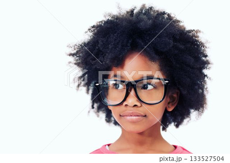 Close up of girl with frizzy hair wearing big glasses 133527504