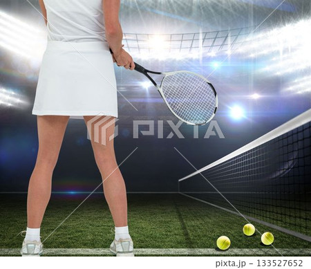 Female tennis player standing at court Female tennis player standing at court 133527652
