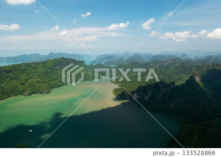 Top view of the mountains and river in KILIM Geopark on a sunny day with a clear sky. Langkawi. Malaysia Top view of the mountains and river in KILIM Geopark on a sunny day with a clear sky. Langkawi. Malaysia 133528866