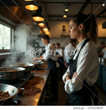 Cooks preparing meals in a busy restaurant kitchen Generative AI 133529607
