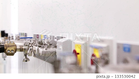 Displaying stainless valve assembly on lab bench with hose coupling, lever valve, colored housings Displaying stainless valve assembly on lab bench with hose coupling, lever valve, colored housings 133530042