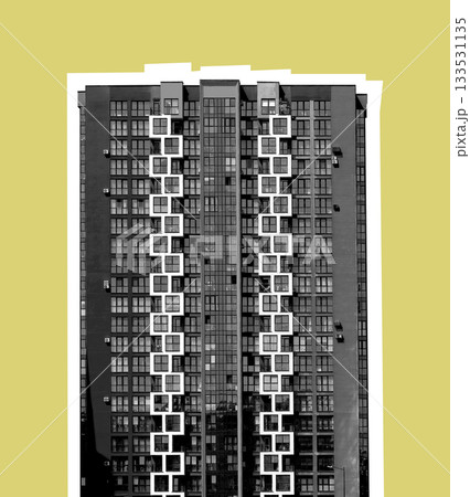Black and white high-rise apartment building with a symmetrical facade of square balconies forming 133531135