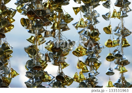 Close up of brass handbells in the temple, Thailand Close up of brass handbells in the temple, Thailand 133531963