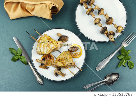 A piece of tuna cooked on a grill. 133533768