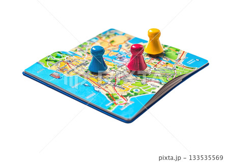 A colorful map with three game pieces placed on it, highlighting different locations. 133535569