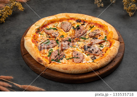 Duck pizza with sliced meat and herbs Duck pizza with sliced meat and herbs 133535718