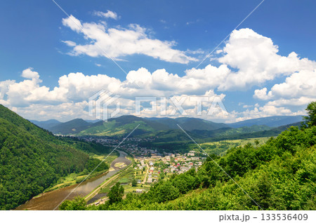 Mountain valley on a background of the river 133536409