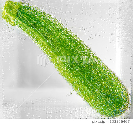 Green zucchini in water Green zucchini in water 133536467