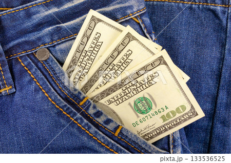 Money dollars in the pocket of jeans Money dollars in the pocket of jeans 133536525