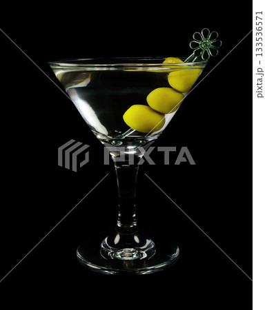 Martini cocktail with olives 133536571