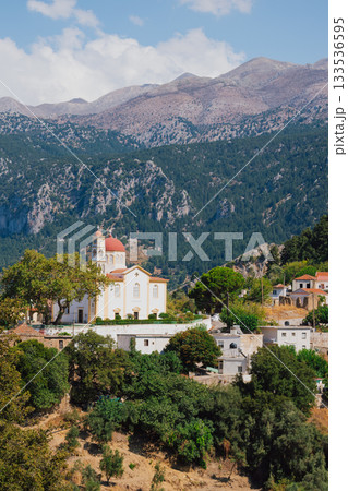 Church and chapel of Agios Mamas in Lakkoi village in Crete mountains on sunny day. 133536595